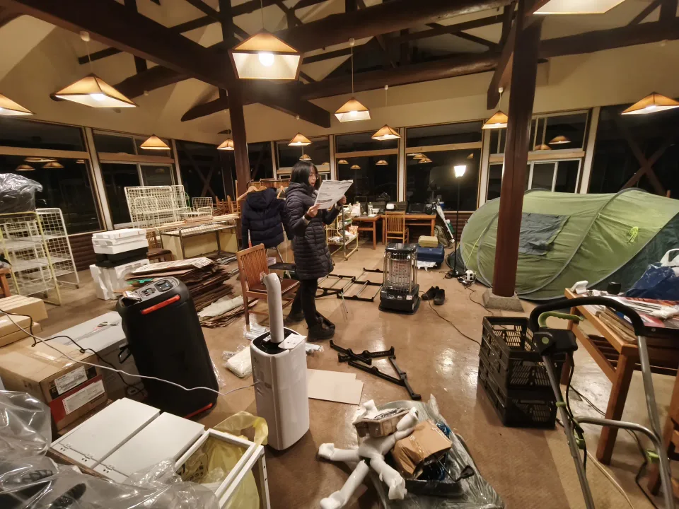 December 2025: the work moves indoors, with a tent still up in the hall